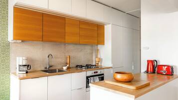 Apartment | Private kitchen | Full-sized fridge, oven, stovetop, dishwasher