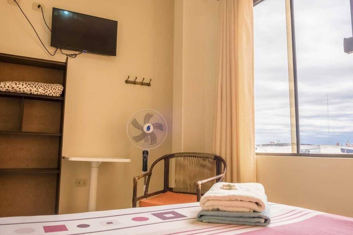 Premium bedding, laptop workspace, free WiFi