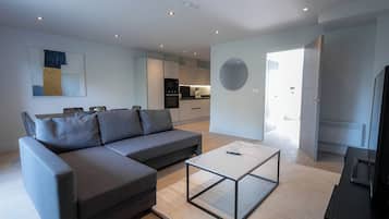 Apartment, 4 Bedrooms | Living area