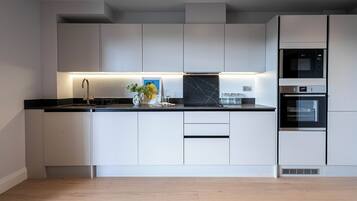 Apartment, 2 Bedrooms | Private kitchen | Full-sized fridge, microwave, oven, stovetop