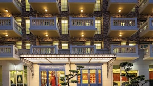 A hotel facade with multiple balconies, a sign reading "TRY BY WYNDHAM", and a "New Taipei City Hotel Registration 327" sign. - Tryp By Wyndham New Taipei Linkou (New Taipei City)