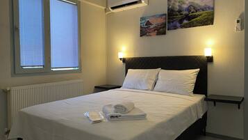 Comfort Twin Room, 2 Bedrooms, City View | Egyptian cotton sheets, premium bedding, free minibar items