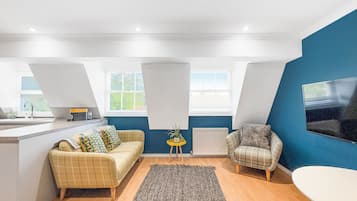 Family Apartment | Living area | 32-inch Smart TV with digital channels, Netflix, streaming services