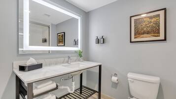 Designer toiletries, hair dryer, towels, soap