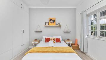 Basic House, Multiple Beds | 2 bedrooms, laptop workspace, iron/ironing board, bed sheets