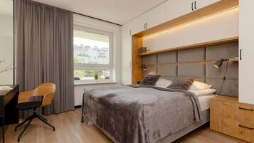 1 bedroom, desk, bed sheets