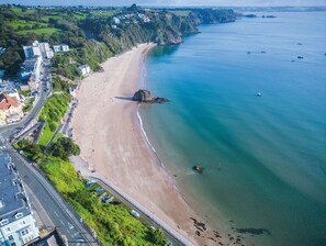 Enjoy the serene coastal views and access to the sandy beach.