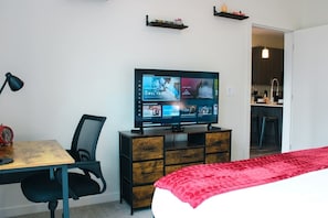 1 bedroom, desk, iron/ironing board, travel cot