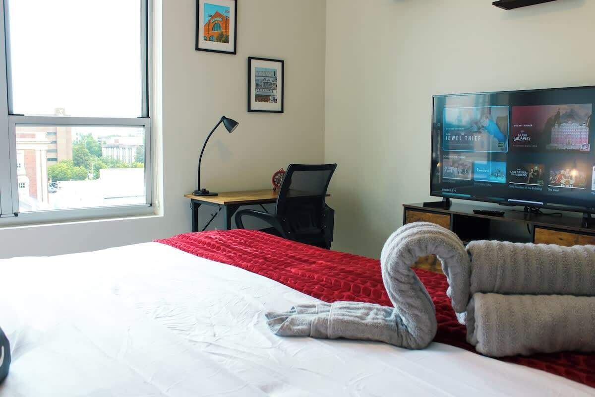 1 bedroom, desk, iron/ironing board, travel crib