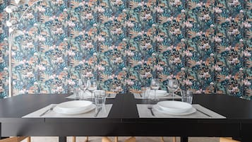 Economy Apartment | Living area | 55-inch TV with satellite channels