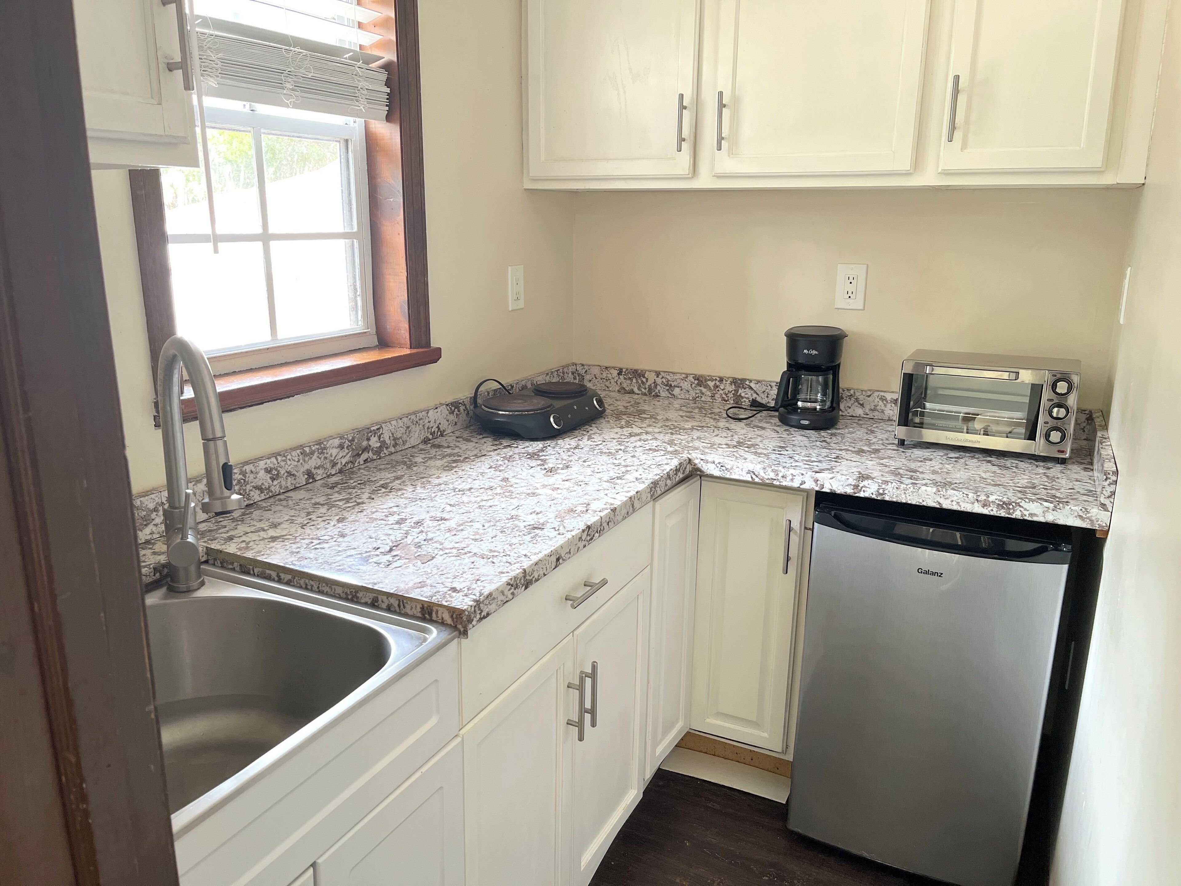 Fridge, microwave, coffee/tea maker, toaster