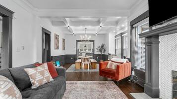 Smart TV, fireplace, books, offices