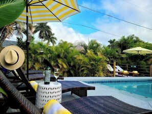 Outdoor pool, a heated pool - 677 Beach Break ·Beautiful 3/3 Home w/ Heated Pool (Naples)