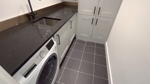Apartamento, várias camas | Parte interna