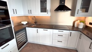 Apartamento, várias camas | Cozinha privada