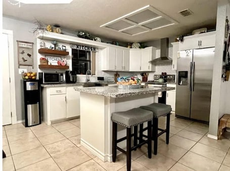 Fridge, microwave, oven, stovetop. 3 Bd/2 Ba open concept home with plenty of parking