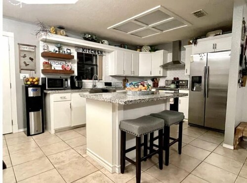 3 Bd/2 Ba open concept home with plenty of parking