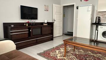 Classic Apartment | Living area | 32-inch TV with digital channels