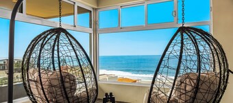 Tropical retreat with ocean views - steps from the sand with alfresco dining