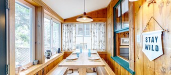 Tranquil cottage near beach with private dock, spacious patio & modern comforts
