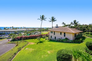 Exterior - Condo with expansive ocean views from the kitchen, lanai & primary suite (Koloa)