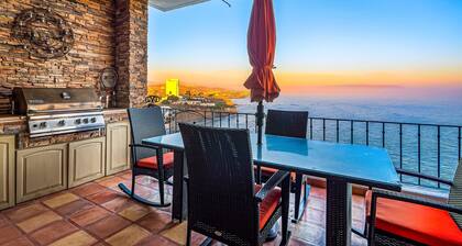 Waterfront condo with heated pool, hot tub, balcony, fireplace, & central AC