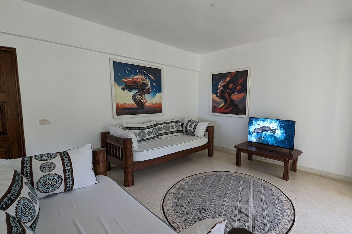 Premium Suite, 2 Bedrooms | Living area | 42-inch Smart TV with digital channels, Netflix, streaming services