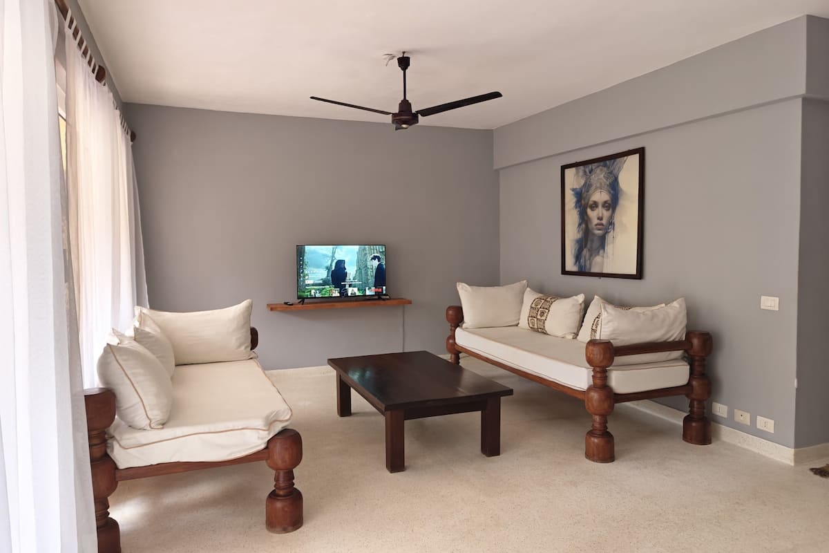 Deluxe Condo, 1 Bedroom, Ocean View | Living area | 42-inch Smart TV with digital channels, Netflix, streaming services