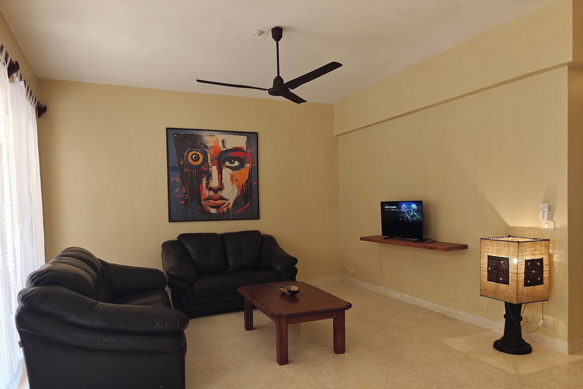 Basic Condo, 1 Bedroom, Garden View, Ground Floor | Living area | 42-inch Smart TV with digital channels, Netflix, streaming services