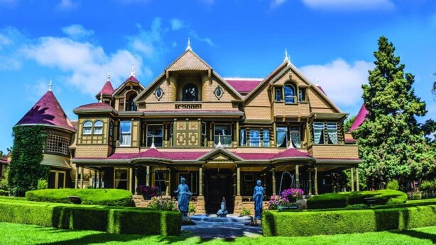A large, ornate Victorian-style building with a symmetrical facade, multiple gables, and a central entrance. - CentralDowntownSanJose-Stunning, fireplace Modern Craftsman house/SAP, Airport (San Jose)