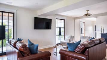 Smart TV, fireplace, table tennis, books