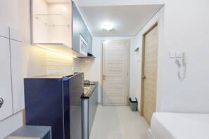 Studio | Living area - Homey And Cozy Living Studio Taman Melati Sinduadi Apartment (Pogung Lor)