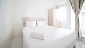 Studio | Free WiFi - Compact And Tidy Studio At Puncak Dharmahusada Apartment (Surabaya)