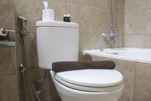 Apartment | Bathroom | Separate bathtub and shower, towels - Warm 1Br Apartment (No Kitchen) At Marbella Suites Dago Pakar Bandung (Bandung)