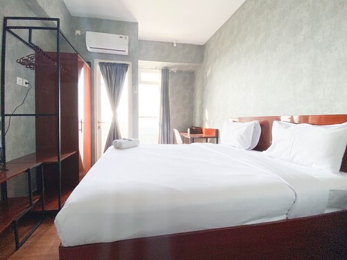 Homey And Good Choice Studio At Amartha View Apartment