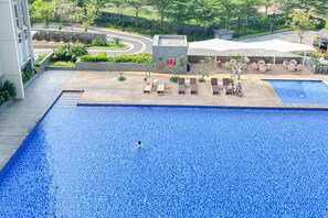 Outdoor pool - Cozy And Minimalist Studio Room Ciputra International Apartment (Jakarta)