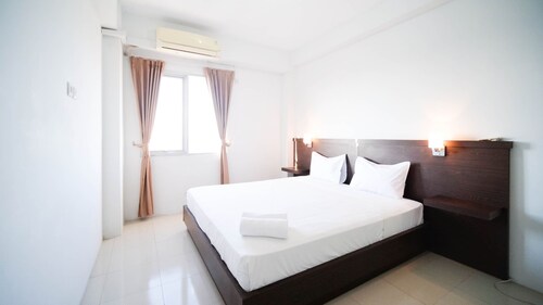 Simple 2Br With Extra Bed At Menara Rungkut Apartment