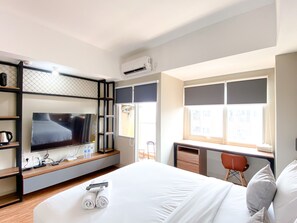 Free WiFi - Homey and Simply Look Studio LRT City Jatibening Apartment (Bekasi)