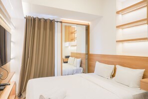 Studio | Free WiFi - Homey Living Studio Room At Tokyo Riverside Pik 2 Apartment (Teluknaga)