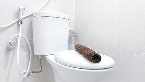 Studio | Bathroom | Shower, towels - Modern And Restful Studio At Kebagusan City Apartment (Jakarta)