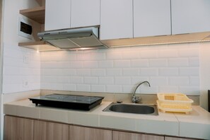 Studio | Private kitchen - Homey Living And Comfy Studio Apartment At B Residence (Pagedangan)