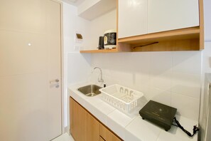 Monolocale | Cucina privata | Frigorifero con congelatore, piano cottura, risottiera