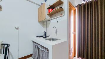 Apartamento | Cozinha privada | Geladeira grande, cooktop, panela elétrica de arroz