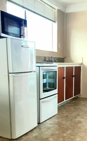 Mini-fridge, microwave, stovetop, toaster