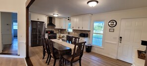 Fully equipped kitchen and dining area