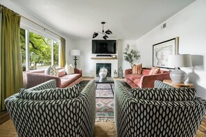 House, Multiple Beds, Pool Access (803 W Travis St.) | Living area | Fireplace - Blissful Haven With Hot Tub & Fire Pit (Fredericksburg)