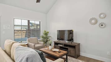 Condo, 1 King Bed, Hot Tub (940 S Eagle B2 #204) | Living area | Fireplace