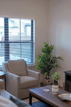 Condo, 1 King Bed, Hot Tub (940 S Eagle B2 #204) | Living area | TV, fireplace