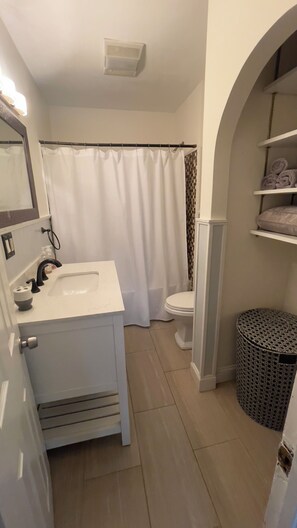 Hair dryer, towels, soap, shampoo