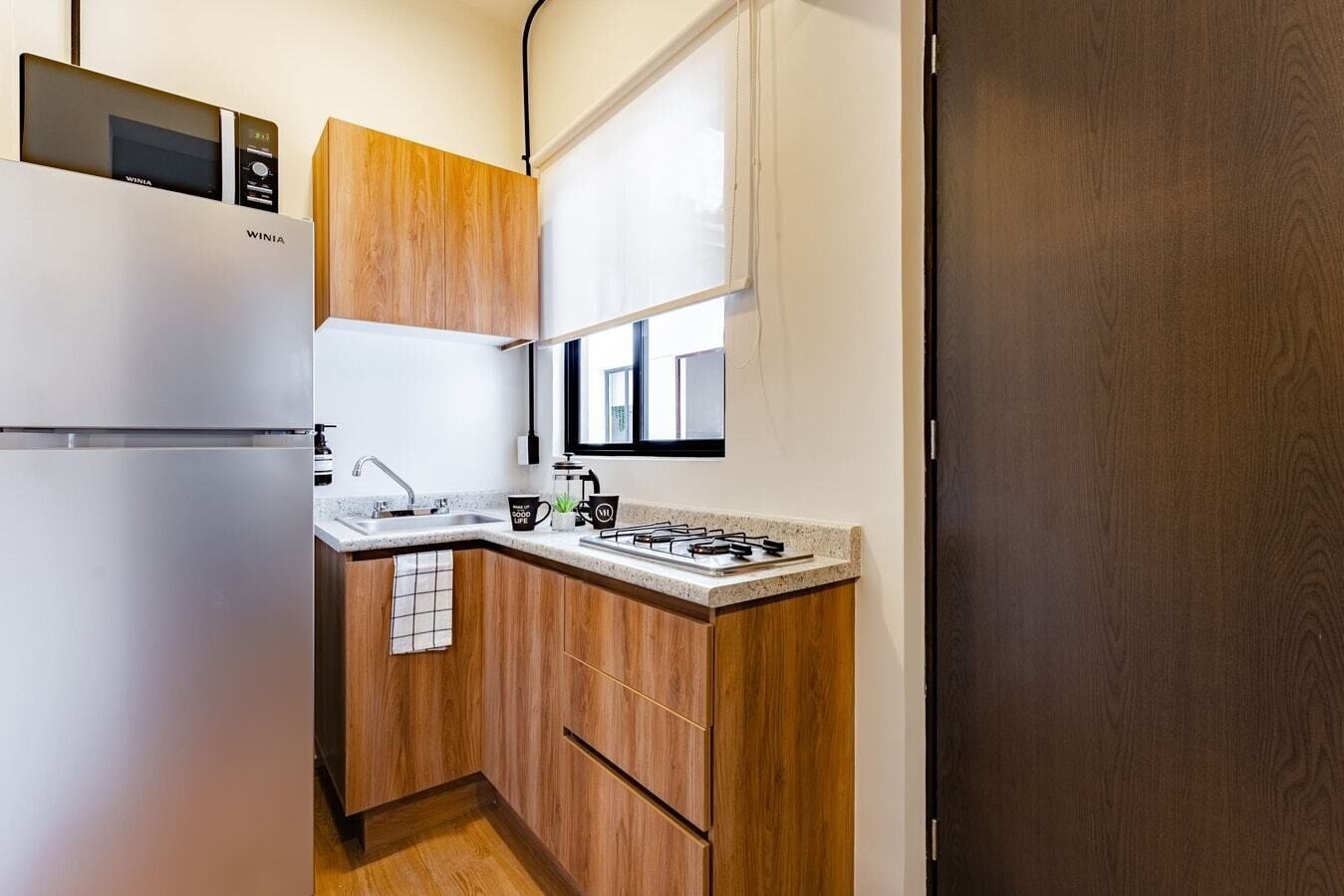 Fridge, microwave, stovetop, coffee/tea maker